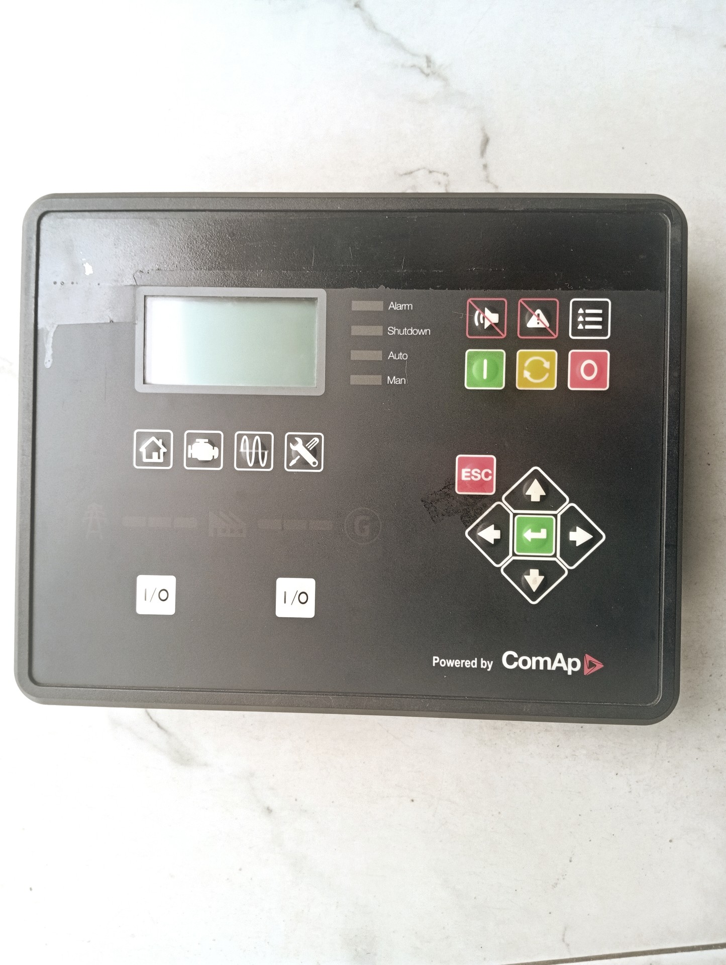 ComAp powered generator controller panel with auto, manual and alarm indicators
